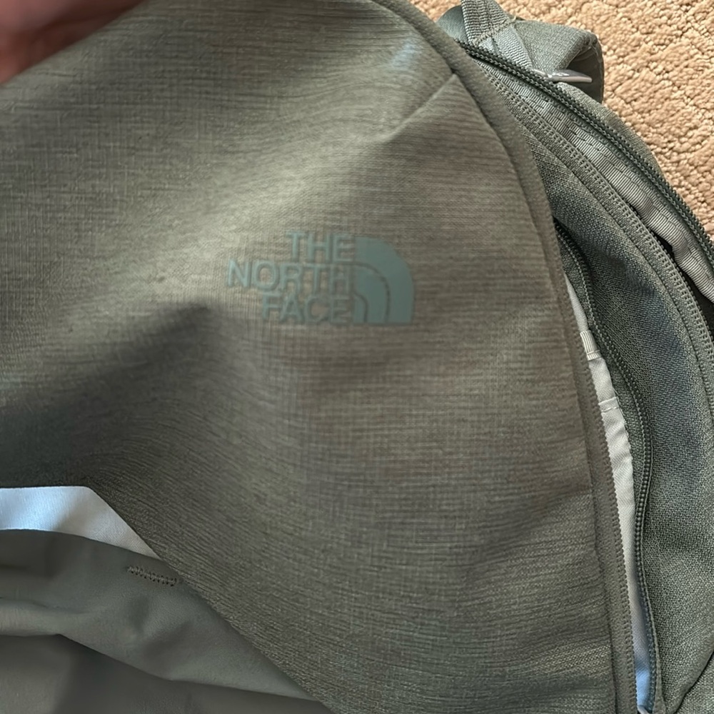 north face green backpack multi zip